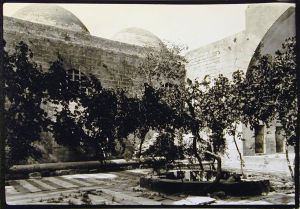 View of Interior Courtyard with Trees and Pool, Madrasa al-Firdaws. Photo © Creswell Archive, Ashmolean Museum, neg. EA.CA.5850. Image courtesy of Fine Arts Library, Harvard College Library.