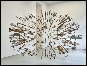 Displayed in art gallery. Damián Ortega, Controller of the Universe (2007, found tools and wire, dimensions vary). Collection of Glenn and Amanda Fuhrman, New York.